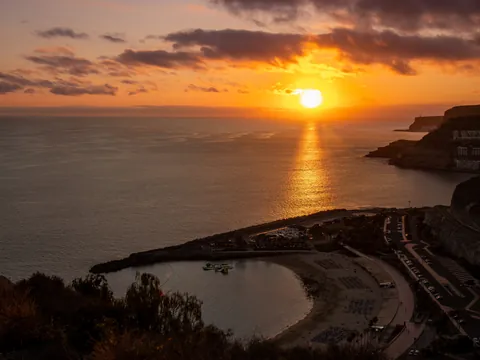 atardecer Puerto Rico Gran Canaria catamarán