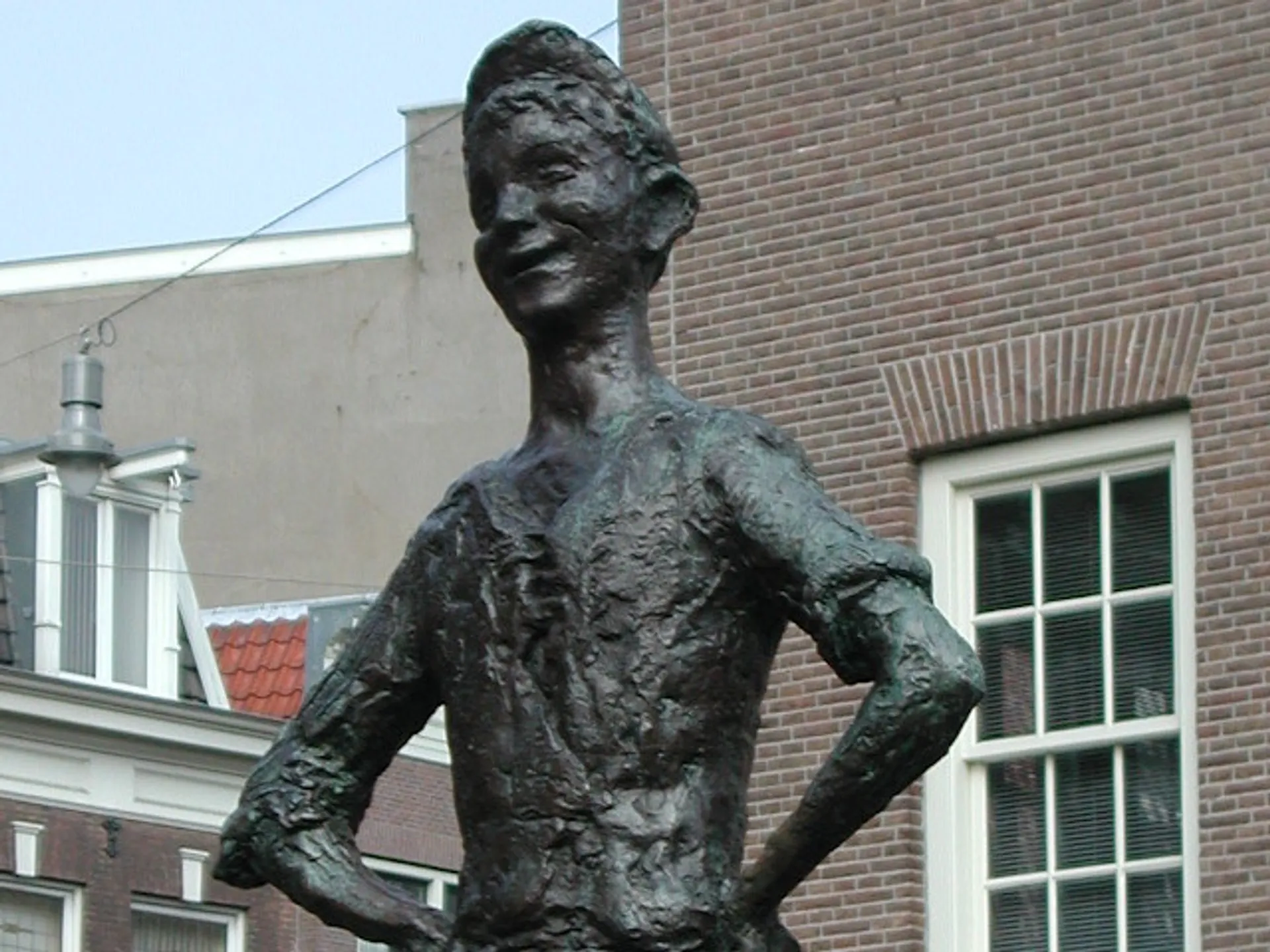 Escultura Het Lieverdje-Ámsterdam que ver-Guía de viaje 