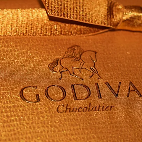 Ticket dorado de la chocolatería Lady Godiva de Bruselas